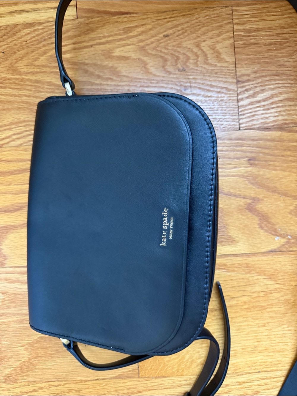 NWOT kate spade black crossbody bag with gold logo
